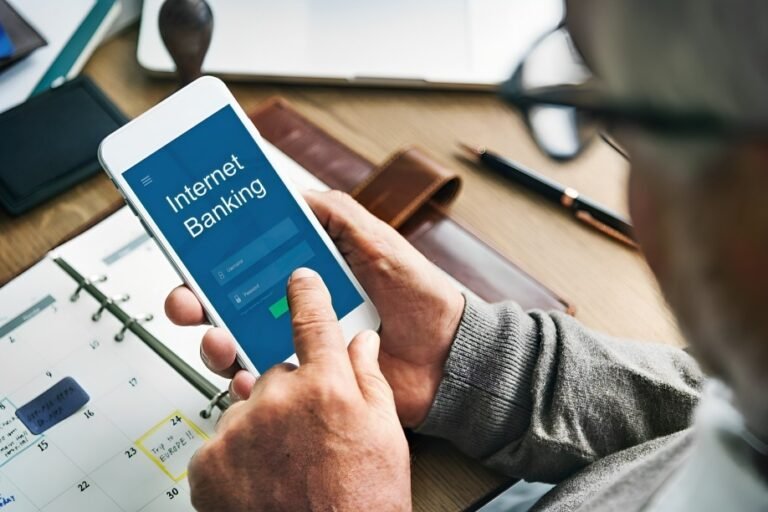 An image representing a laptop and a bank symbol, conveying the ease of online business banking.